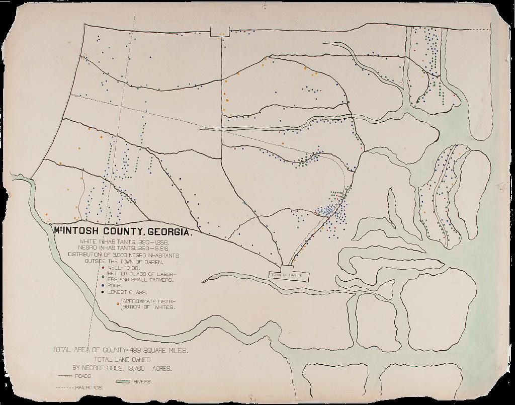 A map of McIntosh County, Georgia that shows color-coded dots corresponding to racial and class divisions. Red dots indicate “well-to-do” Black inhabitants, green dots indicate “better class of laborers and small farmers,” blue dots indicate “poor,” and black dots indicate “lowest class.” A sub-category for the “approximate distribution of whites” is indicated by yellow dots. This map shows a wider view than the grid of Albany, GA, taking into account different rivers, roads, and railways.